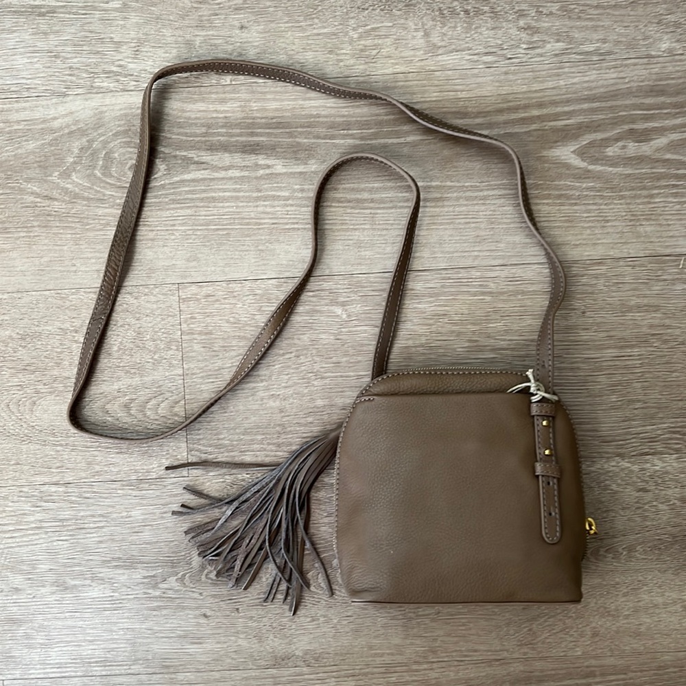 Brown sling purse